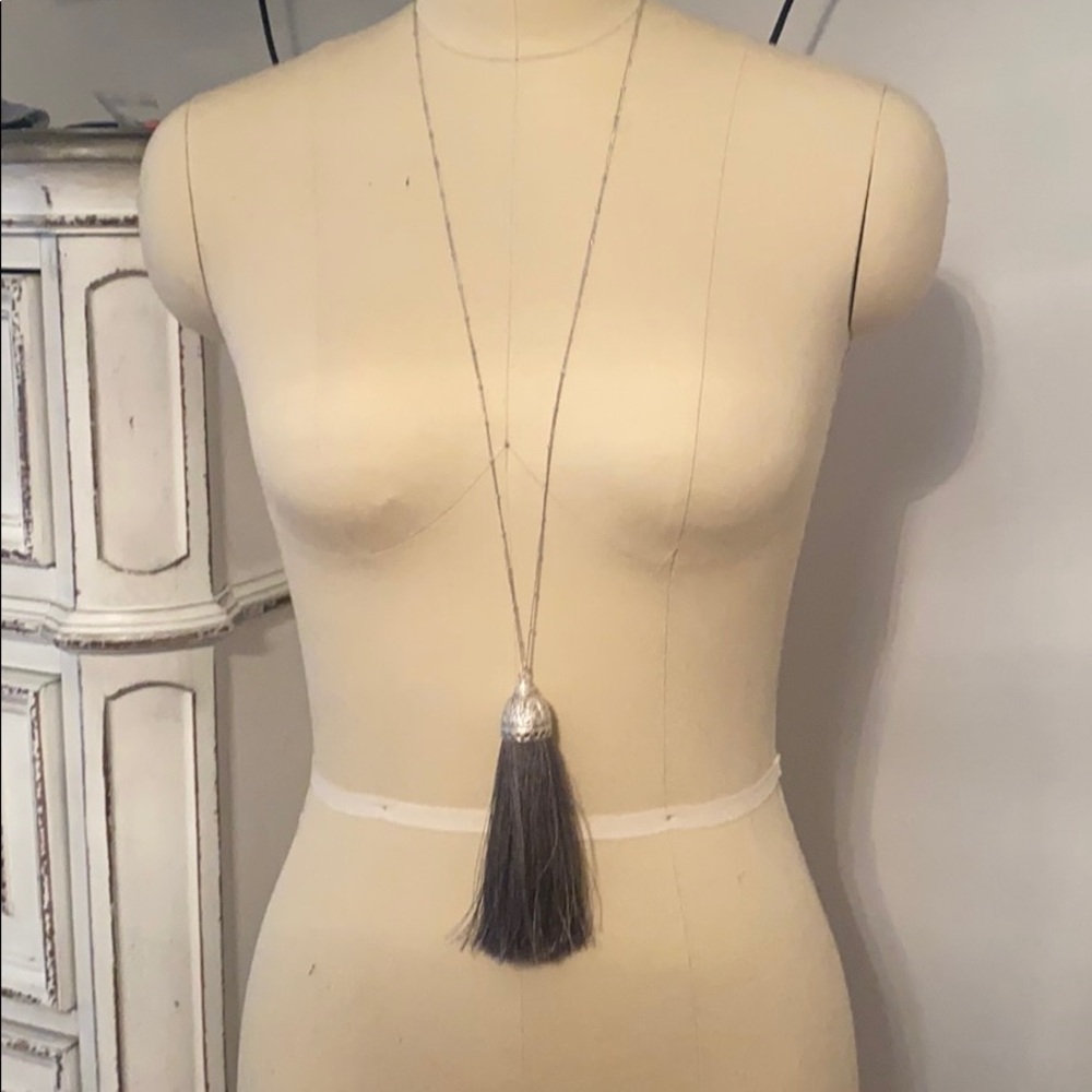 Long silver chain with gray thick tassel